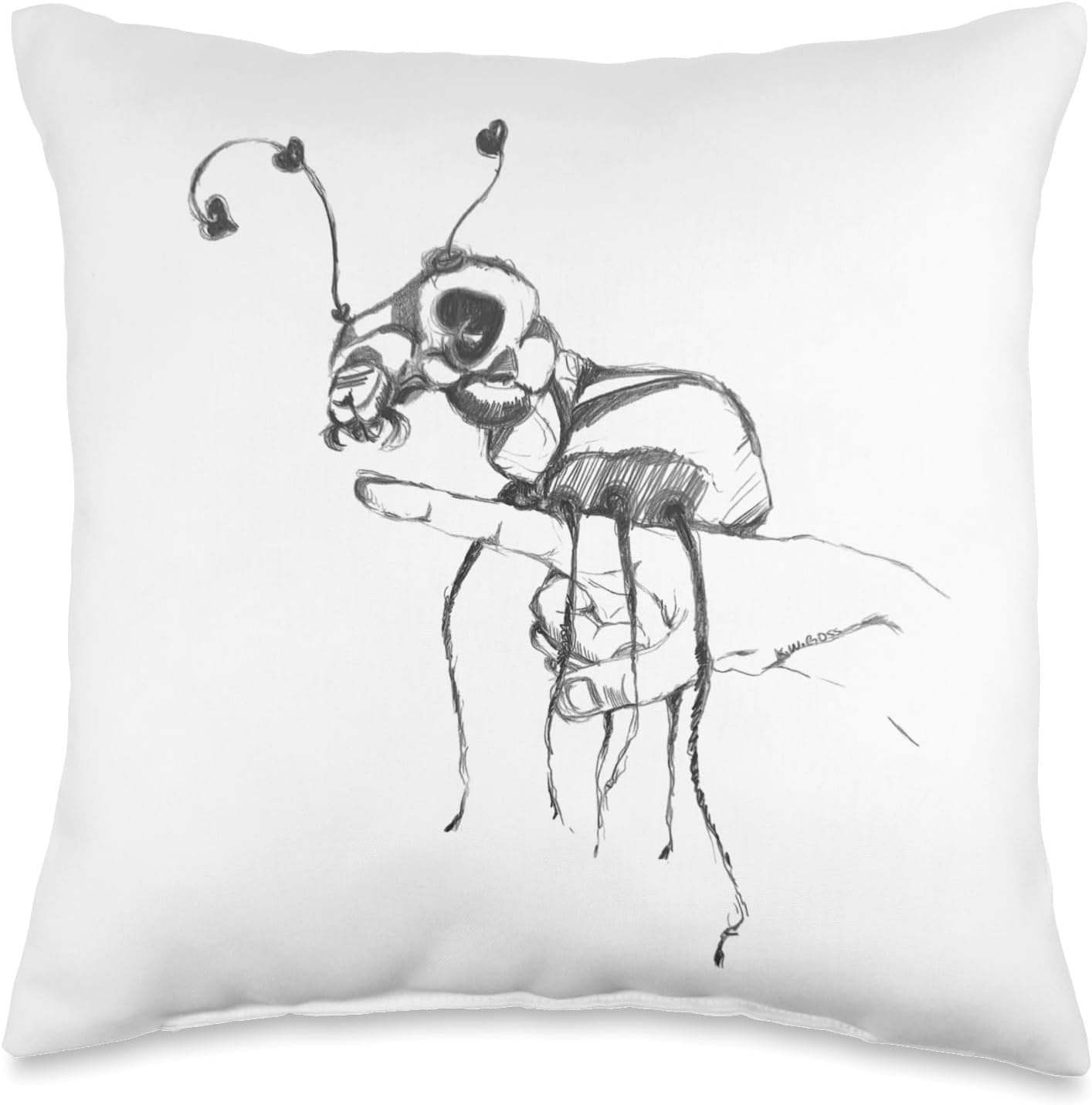 Alt text: "Pencil art design featuring an ant on a finger, showcased on a decorative pillow, highlighting intricate details and artistic expression."