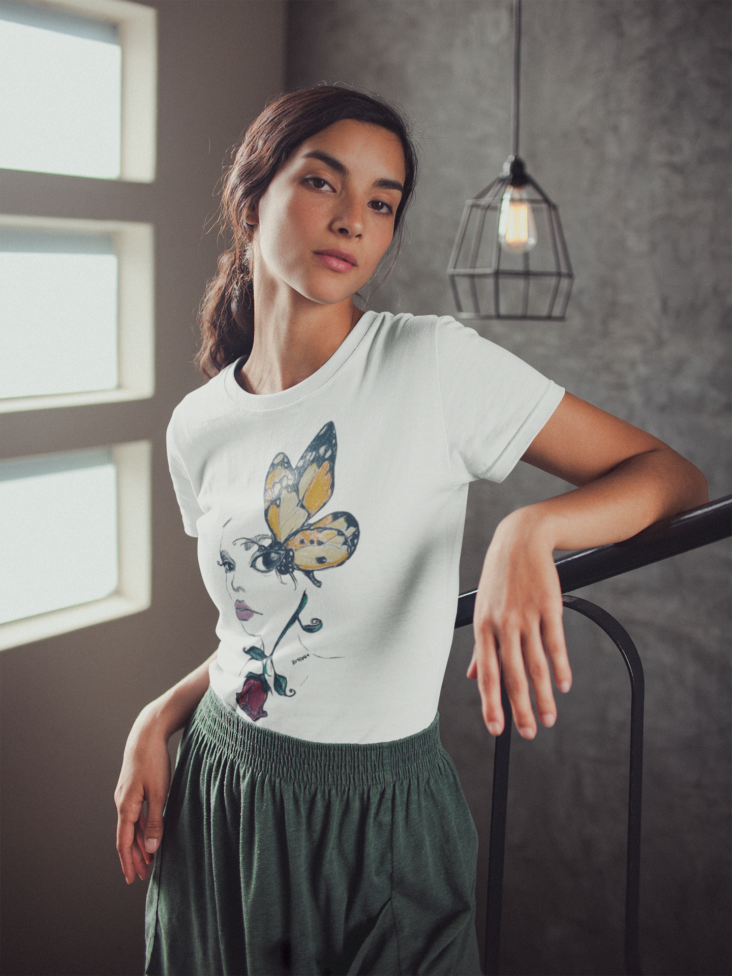 "Pencil art illustration of a girl with a butterfly and rose, featured on a T-shirt design, showcasing intricate details and creativity."